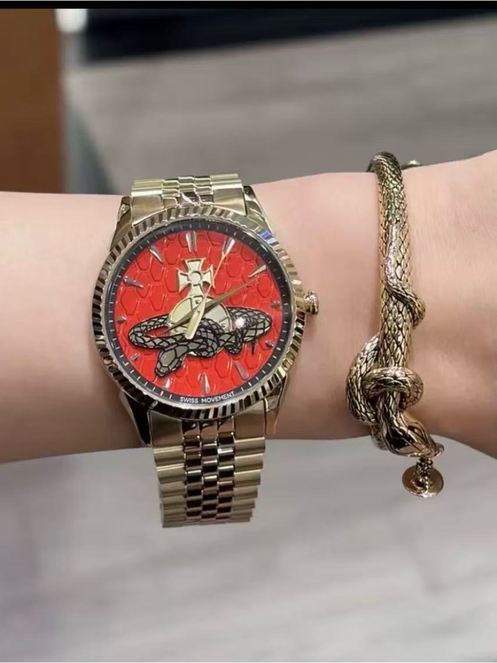 Vivienne Westwood Gold Tone Watch with Red Dial